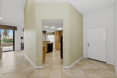 The seller truly delivers on the promise of a rose garden on Palm Valley Country Club in California - for sale on GolfHomes.com, golf home, golf lot