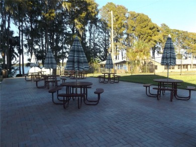 BEAUTIFUL NEW FRONT DOORS, FORMAL LIVING ROOM, DINING ROOM on Highland Lakes Executive Golf Course in Florida - for sale on GolfHomes.com, golf home, golf lot