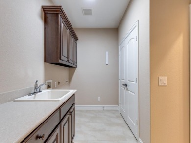 A jewel in Frisco Lakes! This highly-upgraded Sonoma Cove floor on Frisco Lakes Golf Course in Texas - for sale on GolfHomes.com, golf home, golf lot