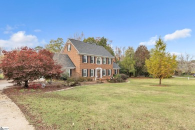 Welcome to your dream home! This stately, three-story brick on Smithfields Country Club in South Carolina - for sale on GolfHomes.com, golf home, golf lot