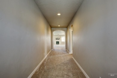 ASSUMABLE FHA LOAN at 2.6%! Don't miss out on this turn-key home on Hunters Point Golf Club in Idaho - for sale on GolfHomes.com, golf home, golf lot