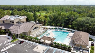 Explore this second floor, highly sought-after Brookside floor on Cedar Hammock Golf and Country Club in Florida - for sale on GolfHomes.com, golf home, golf lot