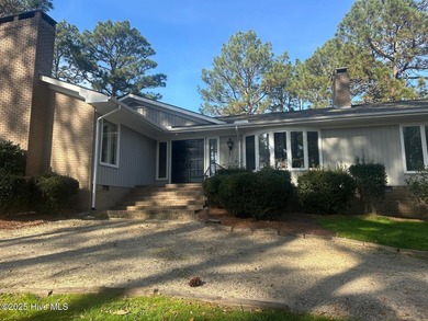 Dreaming of golf front living at it's best? Don't miss out on on Whispering Pines Golf Course in North Carolina - for sale on GolfHomes.com, golf home, golf lot