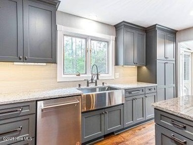 Dreaming of golf front living at it's best? Don't miss out on on Whispering Pines Golf Course in North Carolina - for sale on GolfHomes.com, golf home, golf lot