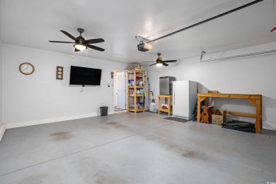 Stunningly kept 3 bedroom and 2 bathroom home in the beautiful on Heron Point Golf Club in South Carolina - for sale on GolfHomes.com, golf home, golf lot