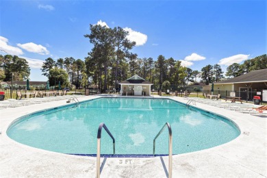 Stunningly kept 3 bedroom and 2 bathroom home in the beautiful on Heron Point Golf Club in South Carolina - for sale on GolfHomes.com, golf home, golf lot