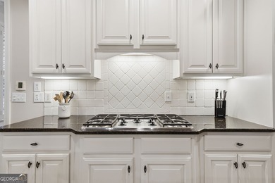 An engaging masterpiece in beautiful Bridgemill Golf & Country on Bridgemill Golf Club in Georgia - for sale on GolfHomes.com, golf home, golf lot