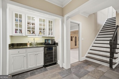 An engaging masterpiece in beautiful Bridgemill Golf & Country on Bridgemill Golf Club in Georgia - for sale on GolfHomes.com, golf home, golf lot