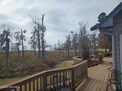 Fabulous Cape Cod style house with detached garaged. This home on Sound Golf Links at Albemarle Plantation in North Carolina - for sale on GolfHomes.com, golf home, golf lot
