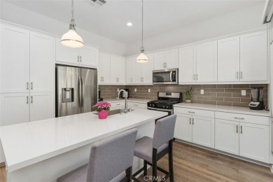 This modern turnkey home features three bedrooms, two and a half on Glen Ivy Golf Club in California - for sale on GolfHomes.com, golf home, golf lot