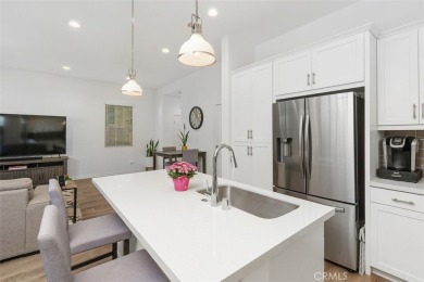 This modern turnkey home features three bedrooms, two and a half on Glen Ivy Golf Club in California - for sale on GolfHomes.com, golf home, golf lot