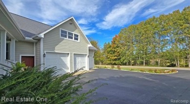 This unique Craftsman-style home offers 1 and a half stories and on Springport Hills Golf Course in Michigan - for sale on GolfHomes.com, golf home, golf lot