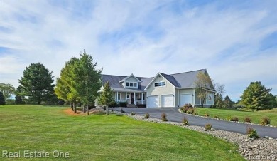 This unique Craftsman-style home offers 1 and a half stories and on Springport Hills Golf Course in Michigan - for sale on GolfHomes.com, golf home, golf lot
