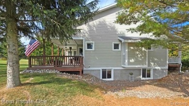 This unique Craftsman-style home offers 1 and a half stories and on Springport Hills Golf Course in Michigan - for sale on GolfHomes.com, golf home, golf lot