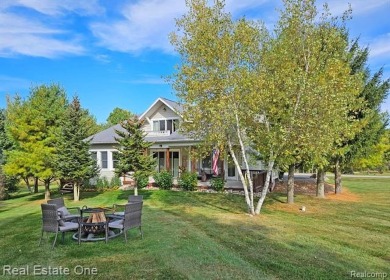 This unique Craftsman-style home offers 1 and a half stories and on Springport Hills Golf Course in Michigan - for sale on GolfHomes.com, golf home, golf lot