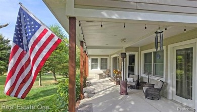 This unique Craftsman-style home offers 1 and a half stories and on Springport Hills Golf Course in Michigan - for sale on GolfHomes.com, golf home, golf lot
