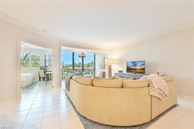 Discover refined coastal living in this rarely available on Club at Pelican Bay Golf Course in Florida - for sale on GolfHomes.com, golf home, golf lot