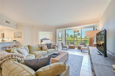 Discover refined coastal living in this rarely available on Club at Pelican Bay Golf Course in Florida - for sale on GolfHomes.com, golf home, golf lot