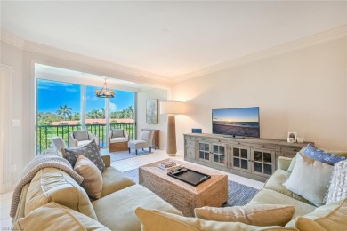 Discover refined coastal living in this rarely available on Club at Pelican Bay Golf Course in Florida - for sale on GolfHomes.com, golf home, golf lot