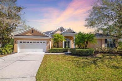 Discover this stunning 4-bedroom, 3-bathroom Neal Built home on University Park Country Club in Florida - for sale on GolfHomes.com, golf home, golf lot