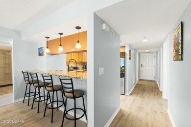 COME HOME TO THIS ELEGANTLY MODERN TAKE ON RELAXED BEACHFRONT on Oceans Golf Club in Florida - for sale on GolfHomes.com, golf home, golf lot