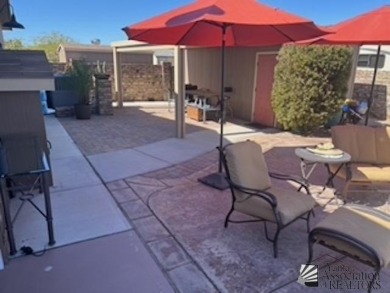 Well appointed with great location for desert  access and golf on Foothills Executive Golf Course in Arizona - for sale on GolfHomes.com, golf home, golf lot