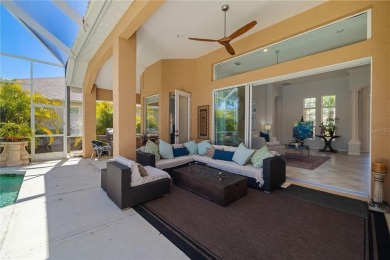 Discover this stunning 4-bedroom, 3-bathroom Neal Built home on University Park Country Club in Florida - for sale on GolfHomes.com, golf home, golf lot