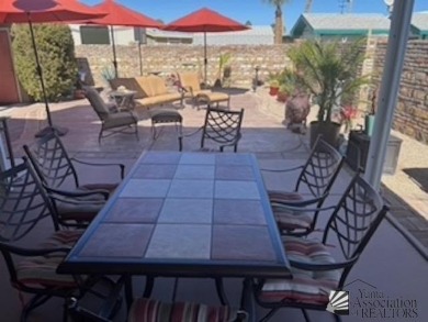 Well appointed with great location for desert  access and golf on Foothills Executive Golf Course in Arizona - for sale on GolfHomes.com, golf home, golf lot