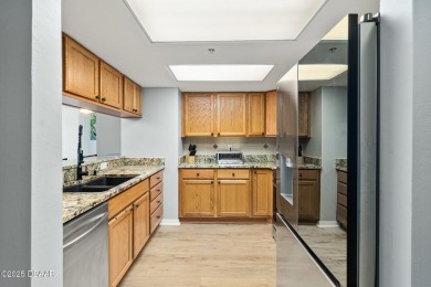 COME HOME TO THIS ELEGANTLY MODERN TAKE ON RELAXED BEACHFRONT on Oceans Golf Club in Florida - for sale on GolfHomes.com, golf home, golf lot