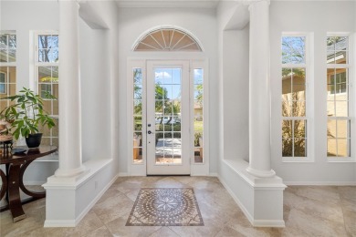 Discover this stunning 4-bedroom, 3-bathroom Neal Built home on University Park Country Club in Florida - for sale on GolfHomes.com, golf home, golf lot