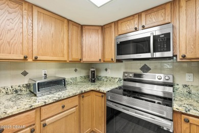 COME HOME TO THIS ELEGANTLY MODERN TAKE ON RELAXED BEACHFRONT on Oceans Golf Club in Florida - for sale on GolfHomes.com, golf home, golf lot