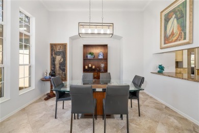 Discover this stunning 4-bedroom, 3-bathroom Neal Built home on University Park Country Club in Florida - for sale on GolfHomes.com, golf home, golf lot
