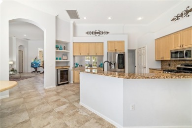 Discover this stunning 4-bedroom, 3-bathroom Neal Built home on University Park Country Club in Florida - for sale on GolfHomes.com, golf home, golf lot