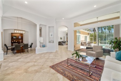 Discover this stunning 4-bedroom, 3-bathroom Neal Built home on University Park Country Club in Florida - for sale on GolfHomes.com, golf home, golf lot