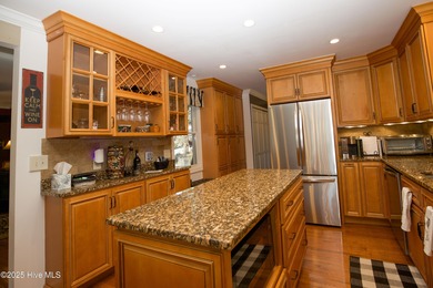 Perfectly positioned on a dog-leg right par five of the Seven on Seven Lakes Country Club in North Carolina - for sale on GolfHomes.com, golf home, golf lot