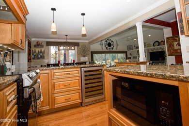 Perfectly positioned on a dog-leg right par five of the Seven on Seven Lakes Country Club in North Carolina - for sale on GolfHomes.com, golf home, golf lot