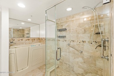 COME HOME TO THIS ELEGANTLY MODERN TAKE ON RELAXED BEACHFRONT on Oceans Golf Club in Florida - for sale on GolfHomes.com, golf home, golf lot