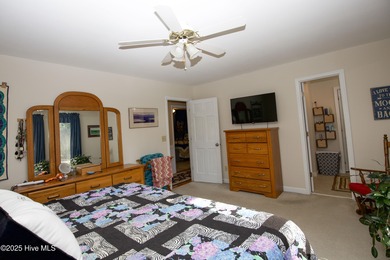 Perfectly positioned on a dog-leg right par five of the Seven on Seven Lakes Country Club in North Carolina - for sale on GolfHomes.com, golf home, golf lot