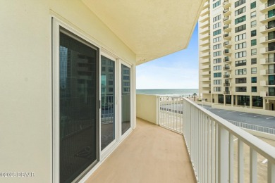 COME HOME TO THIS ELEGANTLY MODERN TAKE ON RELAXED BEACHFRONT on Oceans Golf Club in Florida - for sale on GolfHomes.com, golf home, golf lot