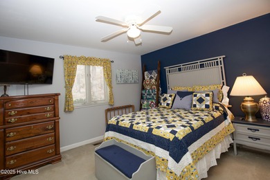 Perfectly positioned on a dog-leg right par five of the Seven on Seven Lakes Country Club in North Carolina - for sale on GolfHomes.com, golf home, golf lot