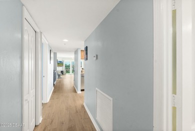 COME HOME TO THIS ELEGANTLY MODERN TAKE ON RELAXED BEACHFRONT on Oceans Golf Club in Florida - for sale on GolfHomes.com, golf home, golf lot