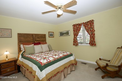 Perfectly positioned on a dog-leg right par five of the Seven on Seven Lakes Country Club in North Carolina - for sale on GolfHomes.com, golf home, golf lot