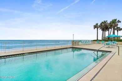 COME HOME TO THIS ELEGANTLY MODERN TAKE ON RELAXED BEACHFRONT on Oceans Golf Club in Florida - for sale on GolfHomes.com, golf home, golf lot