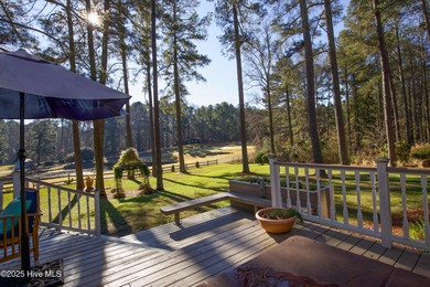 Perfectly positioned on a dog-leg right par five of the Seven on Seven Lakes Country Club in North Carolina - for sale on GolfHomes.com, golf home, golf lot