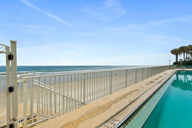 COME HOME TO THIS ELEGANTLY MODERN TAKE ON RELAXED BEACHFRONT on Oceans Golf Club in Florida - for sale on GolfHomes.com, golf home, golf lot