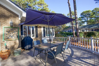 Perfectly positioned on a dog-leg right par five of the Seven on Seven Lakes Country Club in North Carolina - for sale on GolfHomes.com, golf home, golf lot