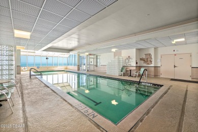 COME HOME TO THIS ELEGANTLY MODERN TAKE ON RELAXED BEACHFRONT on Oceans Golf Club in Florida - for sale on GolfHomes.com, golf home, golf lot