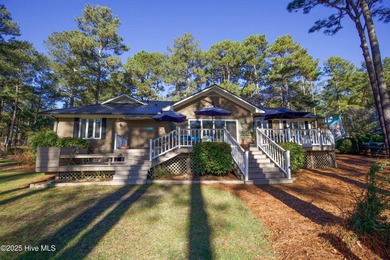 Perfectly positioned on a dog-leg right par five of the Seven on Seven Lakes Country Club in North Carolina - for sale on GolfHomes.com, golf home, golf lot