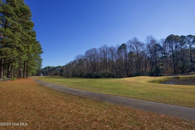 Perfectly positioned on a dog-leg right par five of the Seven on Seven Lakes Country Club in North Carolina - for sale on GolfHomes.com, golf home, golf lot