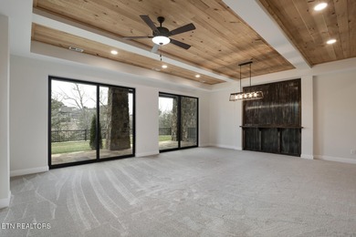 This stunning 2-story basement Craftsman-style home, built in on Wind River Golf Course in Tennessee - for sale on GolfHomes.com, golf home, golf lot